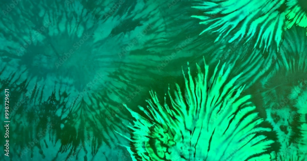 Aufkleber a close-up view tie-dye fabric with a pattern of green and black stripes and lines