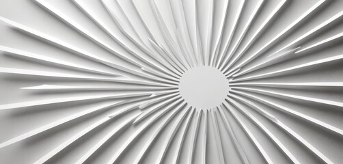 a close-up view white, abstract pattern composed of radiating lines and a central circular element