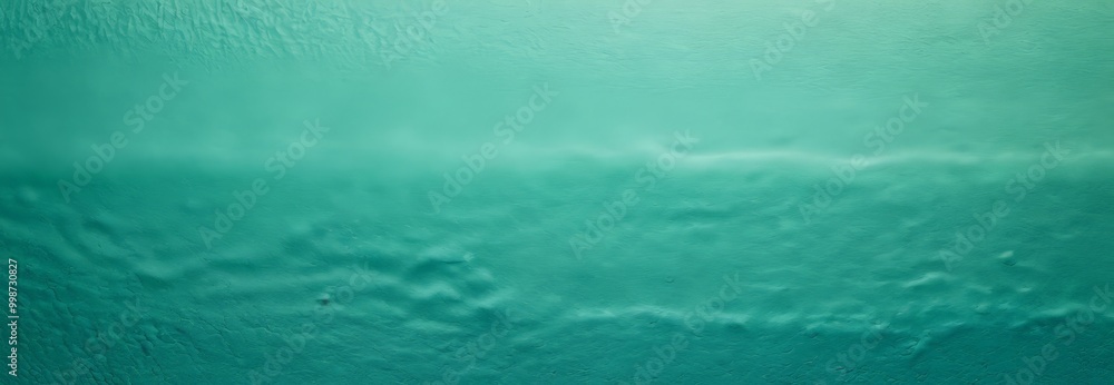 Poster a close-up view textured surface with a gradient of turquoise colors, resembling the ocean or a body