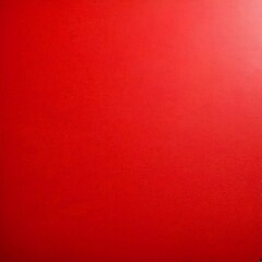 Fototapeta premium a red background with a slight gradient effect, creating a smooth and uniform appearance