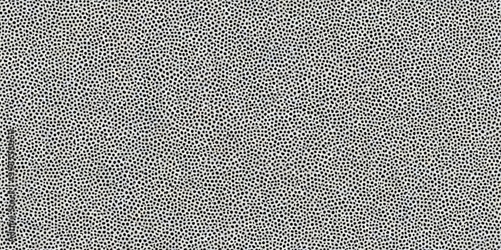 Poster a close-up view textured surface with a repeating pattern of small black dots or spots, creating a visually striking and abstract design