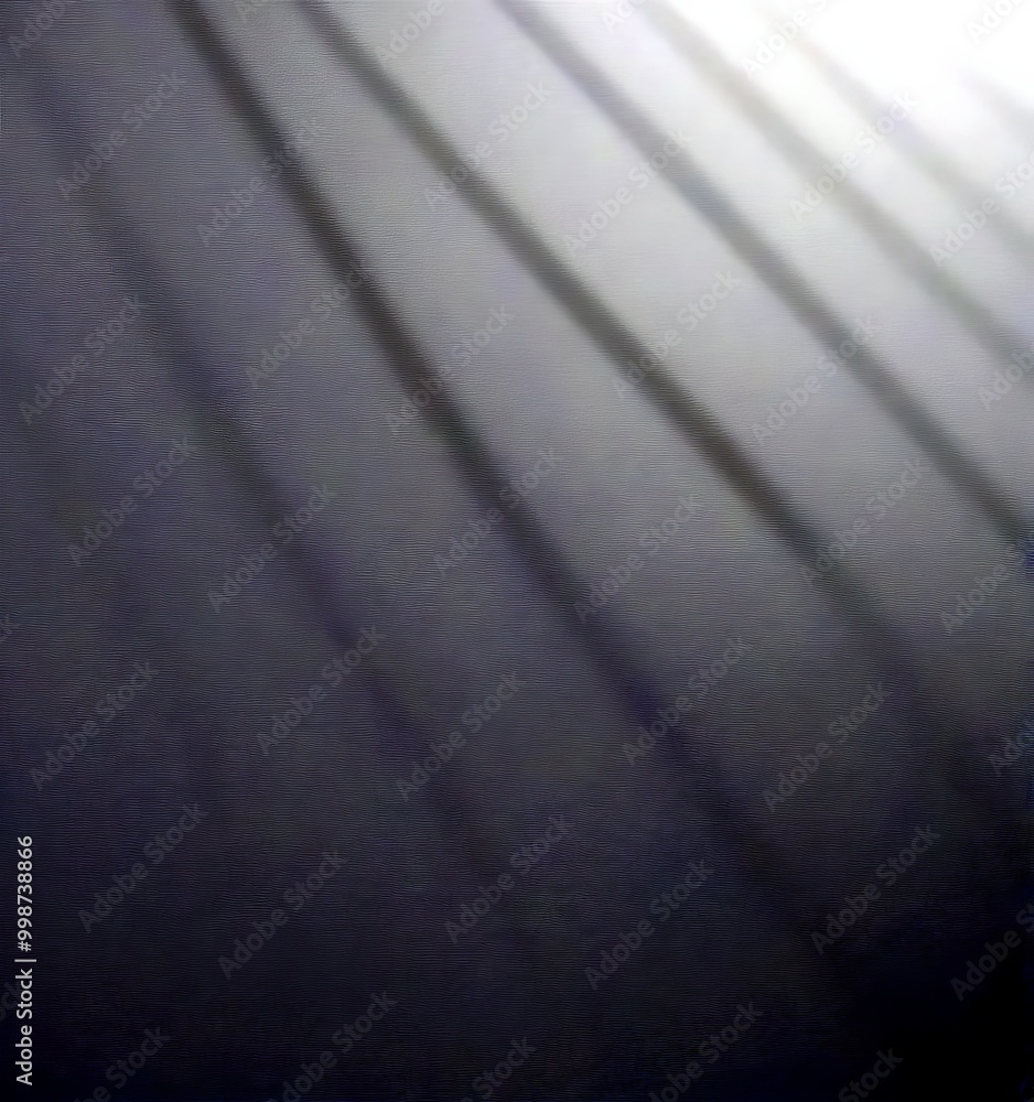 Fototapete a blurred, abstract background with diagonal lines and a gradient of gray tones, creating a sense of depth and movement
