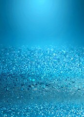 Obraz premium A close-up view glittery blue surface, with a gradient effect transitioning from a darker shade at the top to a lighter one at the bottom