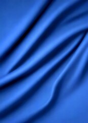 Fototapeta premium a close-up view fabric surface with a deep blue color, exhibiting a smooth and flowing texture
