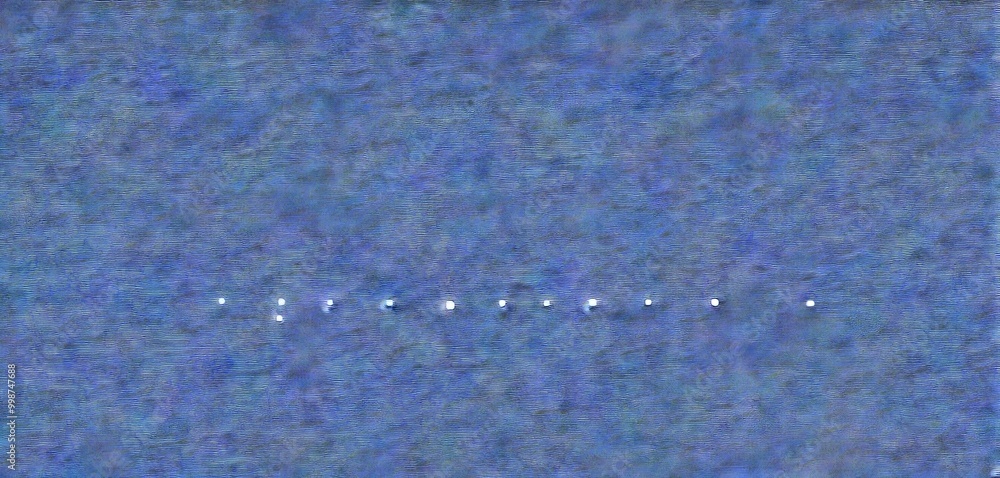Aufkleber a series of white dots arranged in a straight line against a dark background