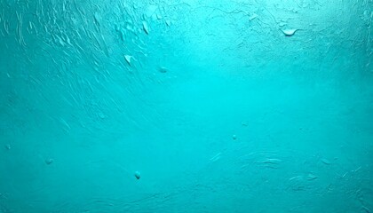 a close-up view textured surface with a vibrant turquoise color The surface appears to be a painted or textured wall, with a rough, uneven texture that gives it a