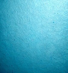 Obraz premium a close-up view textured blue surface, possibly a wall or a window, with small white dots or specks scattered across it, creating a sense of depth and dimension