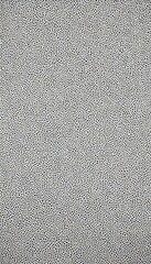 a close-up view textured fabric surface with a repeating pattern of small, irregularly shaped dots or spots in various shades of gray