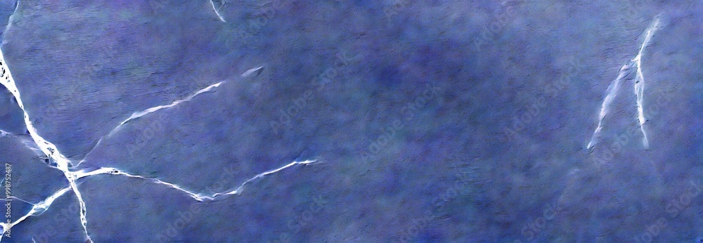 Aufkleber a close-up view dark, textured surface resembling a marble or stone, with a subtle pattern of cracks and lines