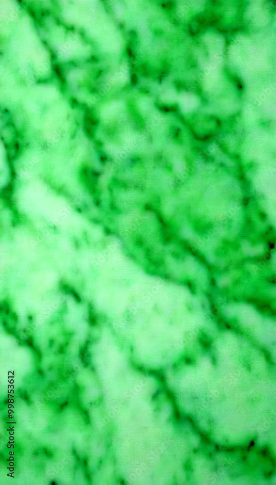 Poster close-up view of a green marble surface, with a blurred background that appears to be a marble patte