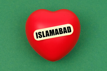 A vibrant red heart representing love for Islamabad against a green backdrop