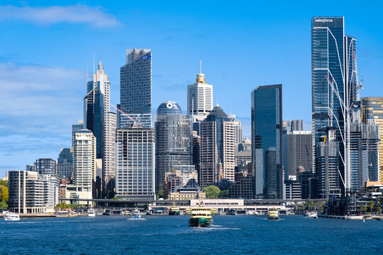 View of Circular Quay and Sydney CBD with numerous skyscrapers in a sunny day in SYDNEY, NEW SOUTH WALES, AUSTRALIA - SEP 13, 2024