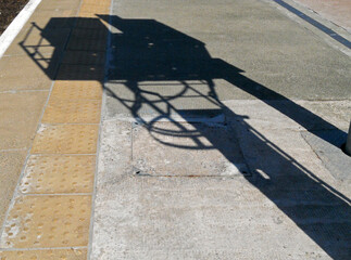 Shadow of Signal Gantry and Ladder on Platform of Scottish Railway Station 