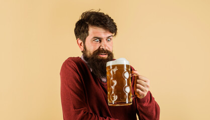Beer time. Craft beer at restaurant. Surprised bearded man drinking delicious beer at pub or bar....