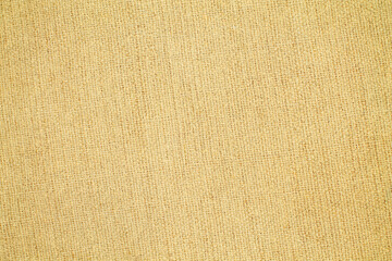 Fototapeta premium Natural Linen Material Textile Canvas Fabric Texture Background Close-up Detail of Fabric Natural Color Hemp Material Pattern Design Wallpaper. Can be Used as Background or For Graphic Design 