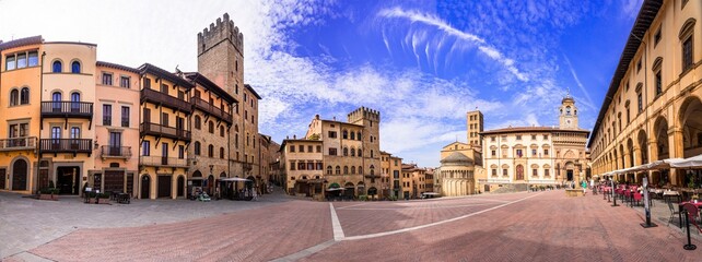 Italy travel and landmarks. Arezzo - beautiful medieval town in Tuscany . Panoramic view of main city scquare - Piazza grande.