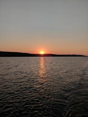 Obraz premium sunset over the river