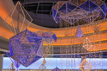 A ceiling adorned with mesmerizing purple lights gracefully hanging from it