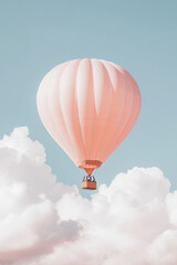 Fototapeta premium Hot air balloon floating in blue sky surrounded by soft clouds