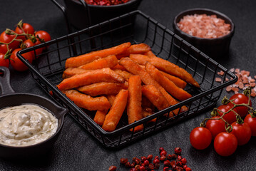 Delicious crispy sweet potato fries with salt, spices and herbs