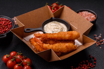 Hot crispy shrimp breaded with salt and spices with white sauce