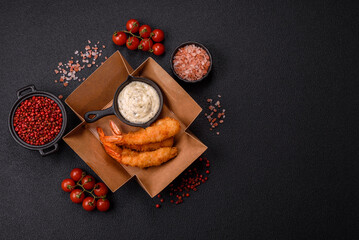 Hot crispy shrimp breaded with salt and spices with white sauce