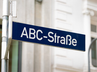 ABC-Straße road name sign in Hamburg Neustadt, Germany. ABC street signage in German language. Guiding in the direction of the infrastructure.