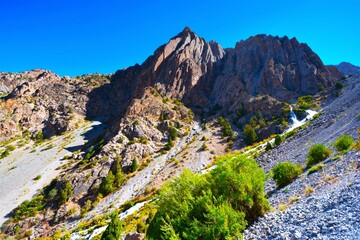 Rock formations seen from the hiking trail leading from Artuch camp to Kulikalon glacial tarns in the Fann Mountains (part of the western Pamir-Alay mountain system, Tajikistan's Sughd Province)