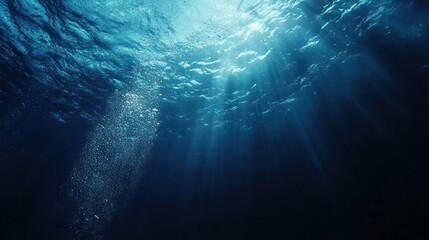 Fototapeta premium Underwater Scene with Sunbeams and Bubbles