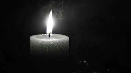 A Single Glittering Candle Burning in the Dark