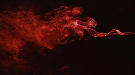 Fototapeta premium Waves of vibrant red smoke swirl dynamically against a stark black background, creating an intense and captivating visual effect.
