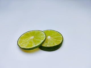 lime slices on white background