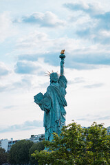 Fototapeta premium Back of the Stature of Liberty on a Cloudy Day
