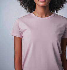 A woman is wearing a pink shirt