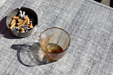 Ashtray for cigarettes and ash when smoking.