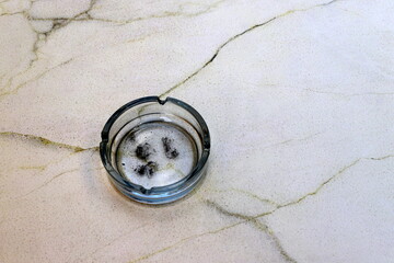 Ashtray for cigarettes and ash when smoking.