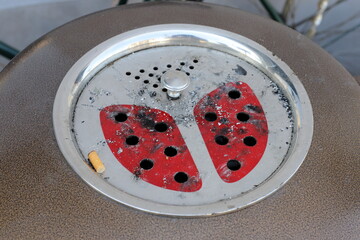 Ashtray for cigarettes and ash when smoking.