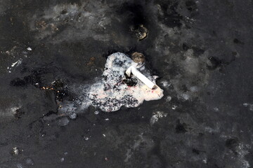 Ashtray for cigarettes and ash when smoking.