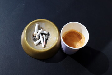 Ashtray for cigarettes and ash when smoking.