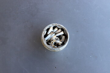 Ashtray for cigarettes and ash when smoking.