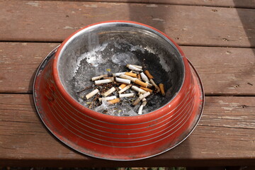 Ashtray for cigarettes and ash when smoking.