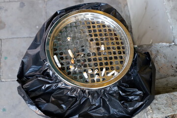 Ashtray for cigarettes and ash when smoking.