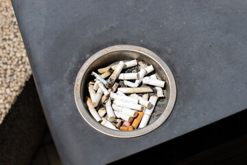 Ashtray for cigarettes and ash when smoking.