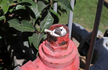 Ashtray for cigarettes and ash when smoking.