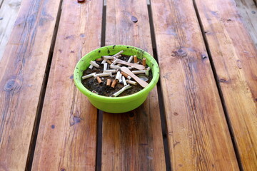 Ashtray for cigarettes and ash when smoking.