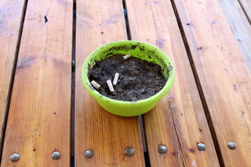 Ashtray for cigarettes and ash when smoking.