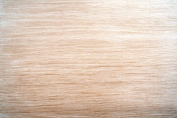 A smooth white wooden surface with fine grain patterns and soft shadows, delivering a clean, minimalist texture.