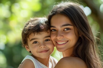 Mother and child smiling outdoors, showcasing love, bonding, and natural happiness in a bright, lush green environment