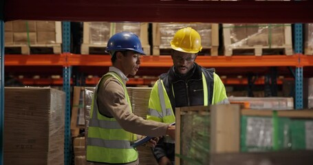Clipboard, employees and tablet in warehouse for inspection, inventory and discussion for planning. Factory, teamwork and people for maintenance, distribution and stock checklist with managers