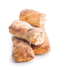 Crusty rustic baguette isolated on white table.